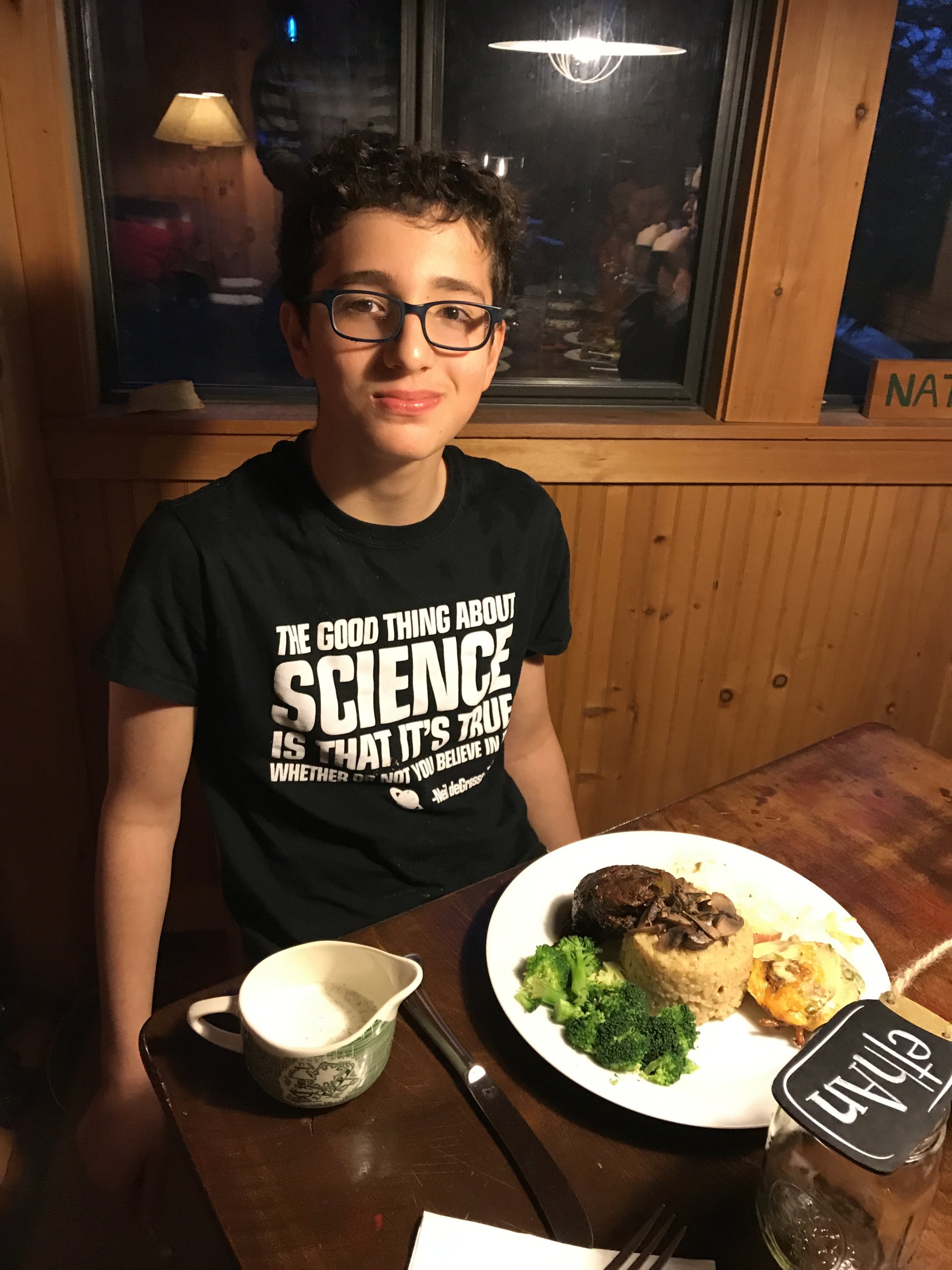 Young man at dinner table
